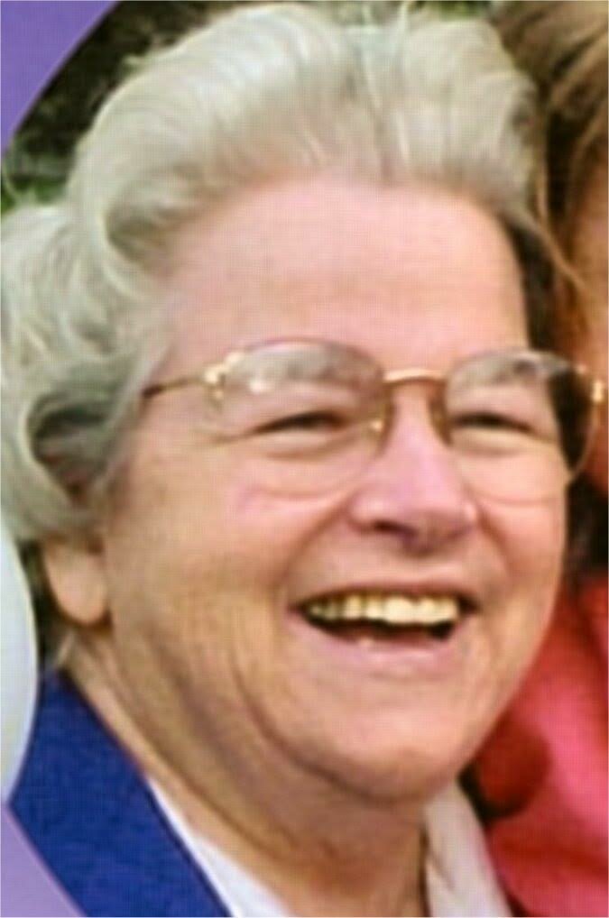 Former member and past president of the Moriches Bay Historical Society